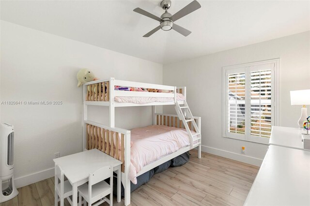 1020 SW 19th St SW, Naples, FL 34117 - bedroom with light wood-style floors and ceiling fan