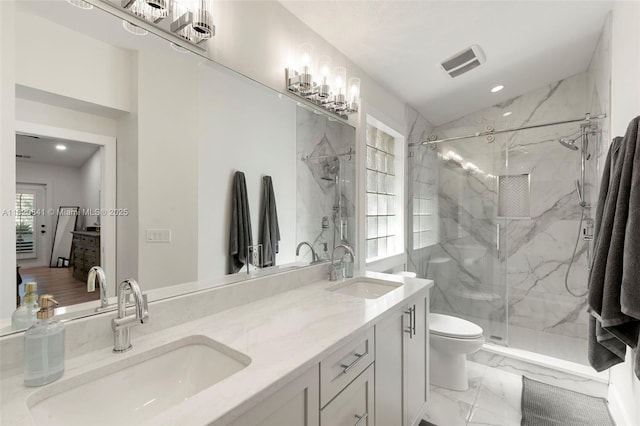 1020 SW 19th St SW, Naples, FL 34117 - full bath with marble finish floors, a marble finish shower, double vanity, recessed lighting, and connected bathroom
