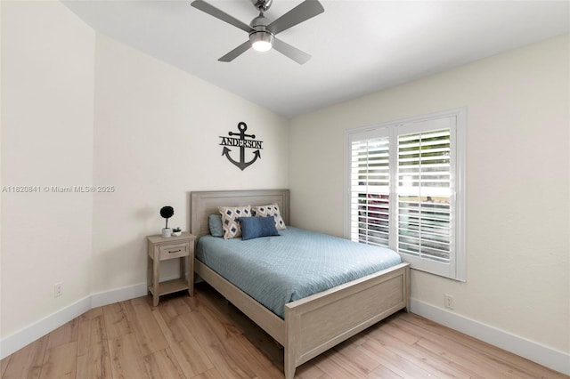 1020 SW 19th St SW, Naples, FL 34117 - bedroom with light wood-style flooring and ceiling fan