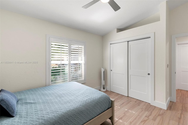 1020 SW 19th St SW, Naples, FL 34117 - bedroom with lofted ceiling, light wood-type flooring, a closet, and ceiling fan