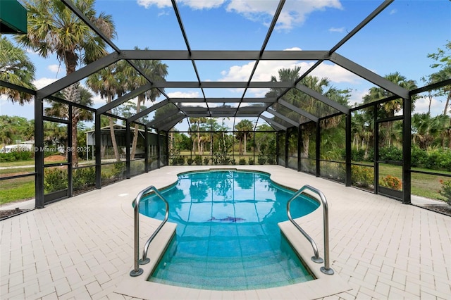 1020 SW 19th St SW, Naples, FL 34117 - swimming pool with a patio and glass enclosure