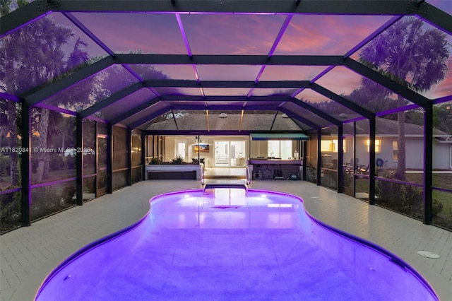 1020 SW 19th St SW, Naples, FL 34117 - swimming pool with a patio area and glass enclosure