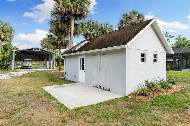 1020 SW 19th St SW, Naples, FL 34117 - view of outdoor structure featuring a detached carport and driveway