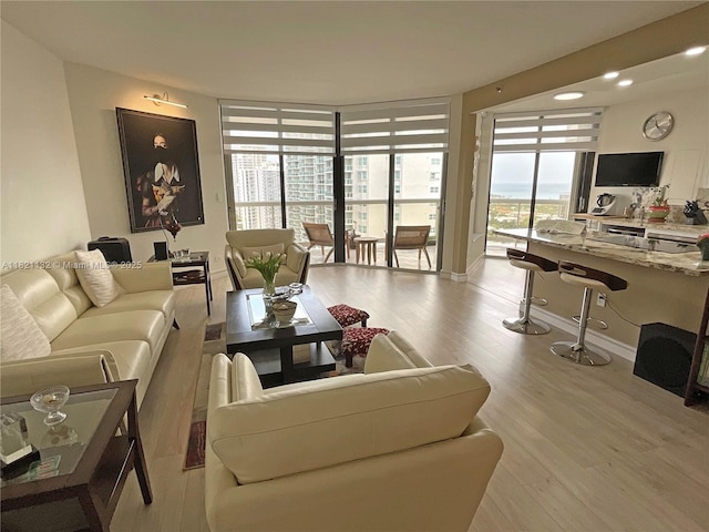 20191 E Country Club Dr Unit 1903, Aventura, FL 33180 - living area with wood finished floors, expansive windows, and recessed lighting