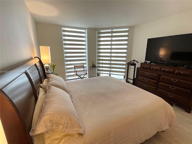 20191 E Country Club Dr Unit 1903, Aventura, FL 33180 - bedroom with light wood-style floors