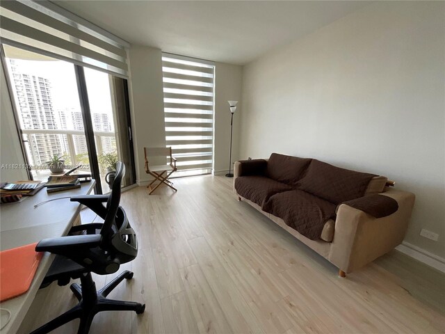 20191 E Country Club Dr Unit 1903, Aventura, FL 33180 - office area with light wood-style floors and floor to ceiling windows