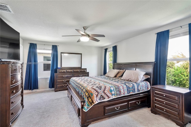 5720 Mentmore Dr, Mangonia Park, FL 33407 - bedroom featuring light colored carpet and a ceiling fan