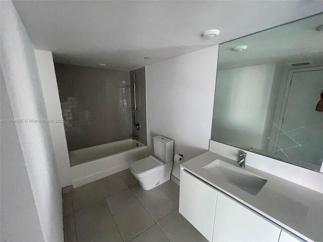 1025 92nd St Unit 607, Bay Harbor Islands, FL 33154 - full bathroom with tile patterned floors, vanity, and washtub / shower combination