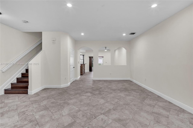 13227 SW 42nd St Unit 8103, Miramar, FL 33027 - unfurnished room featuring arched walkways, stairway, and recessed lighting