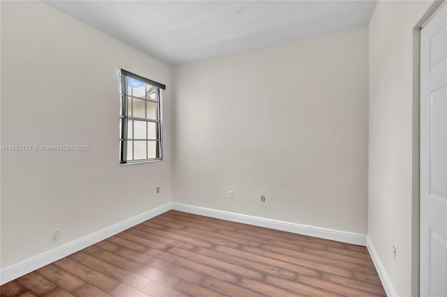 13227 SW 42nd St Unit 8103, Miramar, FL 33027 - unfurnished room featuring baseboards and dark wood-style flooring