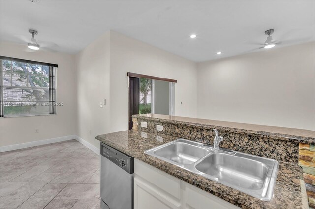 13227 SW 42nd St Unit 8103, Miramar, FL 33027 - kitchen featuring stainless steel dishwasher, ceiling fan, white cabinets, recessed lighting, and dark stone counters