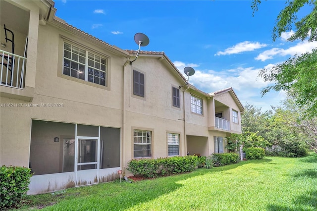 13227 SW 42nd St Unit 8103, Miramar, FL 33027 - back of property featuring stucco siding and a lawn