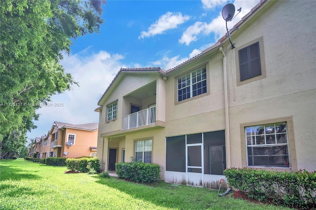 13227 SW 42nd St Unit 8103, Miramar, FL 33027 - back of house with stucco siding and a lawn