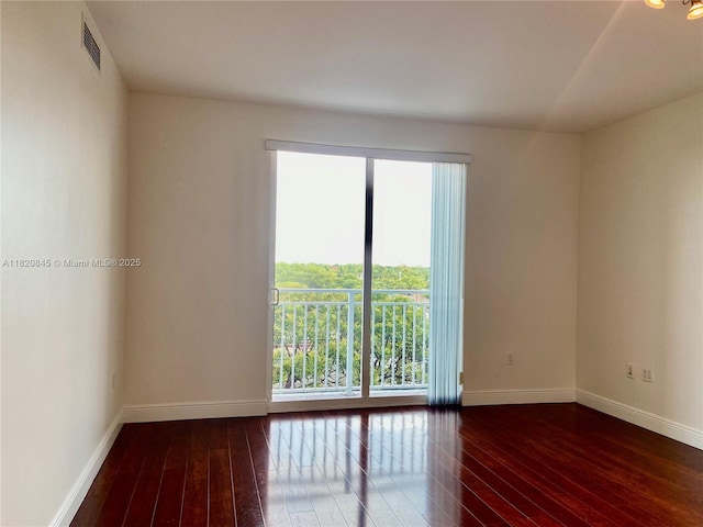 7275 SW 90th Way Unit 405, Miami, FL 33156 - unfurnished room featuring wood-type flooring and baseboards