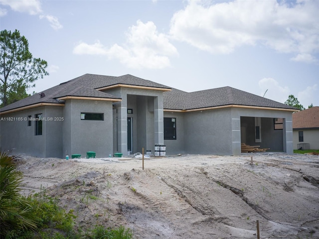811 Rush Ave, Lehigh Acres, FL 33972 - prairie-style house featuring stucco siding