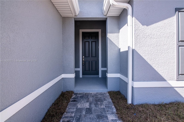 21475 Argosy Ave, Port Charlotte, FL 33954 - property entrance with stucco siding