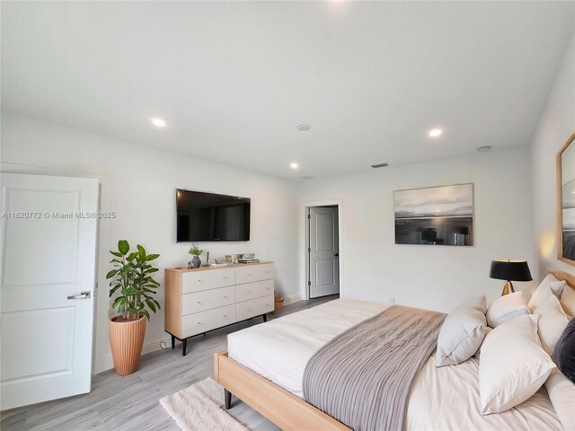 21475 Argosy Ave, Port Charlotte, FL 33954 - bedroom featuring light wood-style flooring and recessed lighting