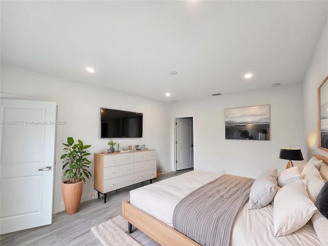 21475 Argosy Ave, Port Charlotte, FL 33954 - bedroom with light wood-style floors and recessed lighting