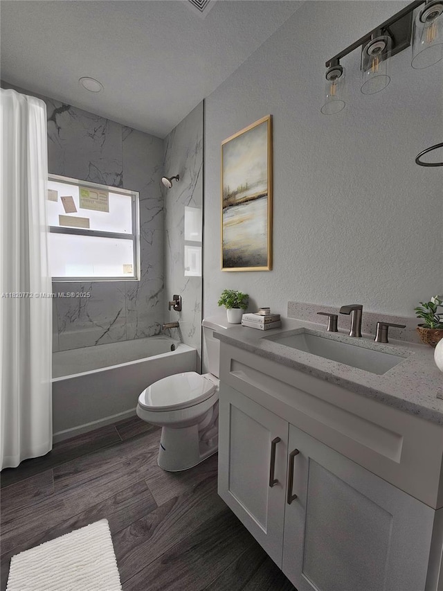 21475 Argosy Ave, Port Charlotte, FL 33954 - bathroom featuring vanity, shower / tub combination, and wood finished floors