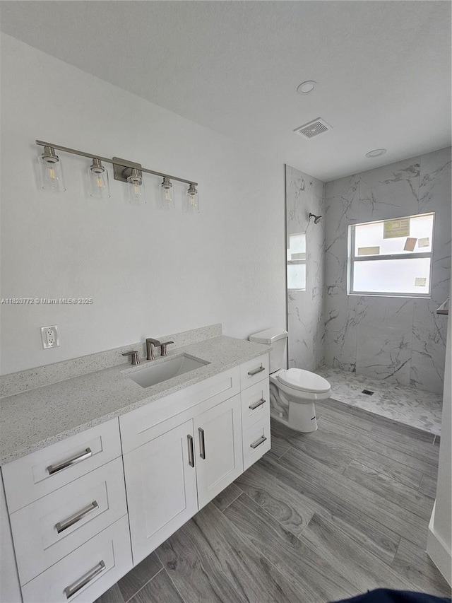 21475 Argosy Ave, Port Charlotte, FL 33954 - full bathroom featuring a marble finish shower and vanity