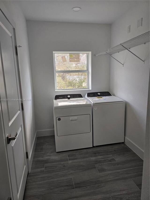 21475 Argosy Ave, Port Charlotte, FL 33954 - washroom featuring independent washer and dryer and dark wood finished floors