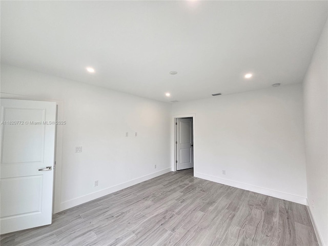 21475 Argosy Ave, Port Charlotte, FL 33954 - unfurnished room featuring light wood-style floors and recessed lighting