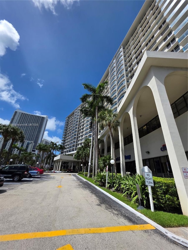 3800 S Ocean Dr Unit 425, Hollywood, FL 33019 - view of building exterior featuring uncovered parking