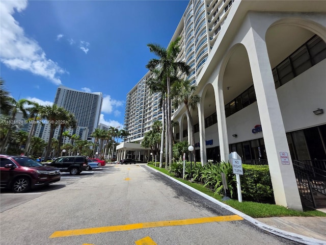 3800 S Ocean Dr Unit 425, Hollywood, FL 33019 - view of apartment building / complex featuring uncovered parking