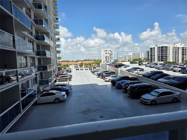 3800 S Ocean Dr Unit 425, Hollywood, FL 33019 - uncovered parking lot featuring a view of city