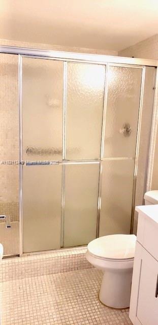 3800 S Ocean Dr Unit 425, Hollywood, FL 33019 - bathroom with vanity, tile patterned flooring, and a shower stall