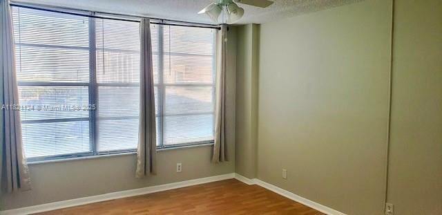 3800 S Ocean Dr Unit 425, Hollywood, FL 33019 - empty room with a ceiling fan and wood finished floors