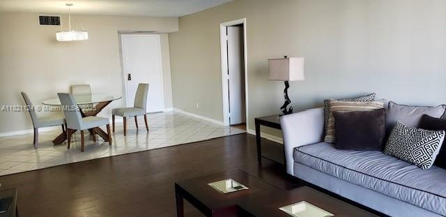 3800 S Ocean Dr Unit 425, Hollywood, FL 33019 - living area featuring baseboards