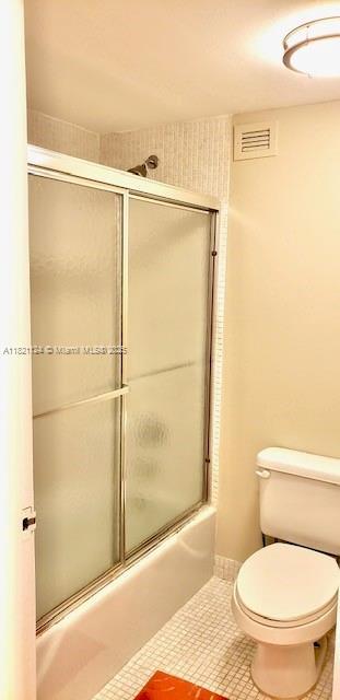 3800 S Ocean Dr Unit 425, Hollywood, FL 33019 - bathroom featuring combined bath / shower with glass door and tile patterned floors