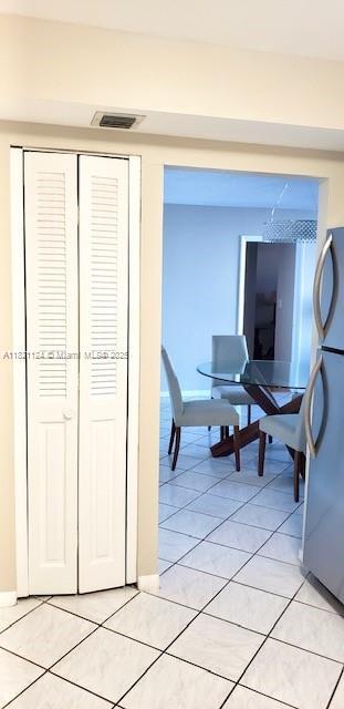 3800 S Ocean Dr Unit 425, Hollywood, FL 33019 - hallway with light tile patterned floors