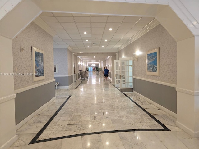 3800 S Ocean Dr Unit 425, Hollywood, FL 33019 - hallway featuring ornamental molding, marble tiled floors, recessed lighting, and french doors