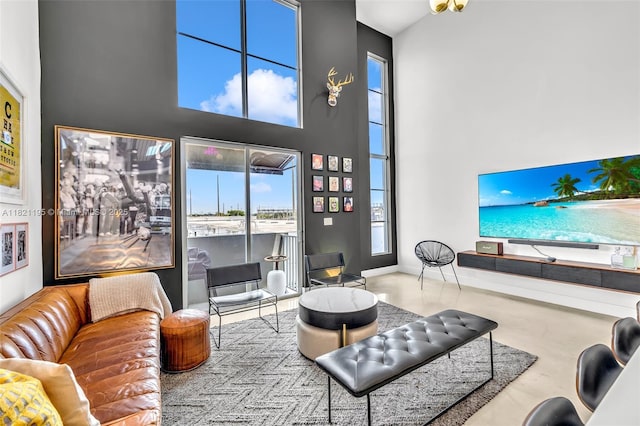 410 NE 36th St Unit 10, Oakland Park, FL 33334 - living area featuring a high ceiling