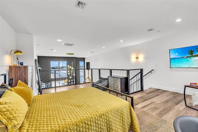 410 NE 36th St Unit 10, Oakland Park, FL 33334 - bedroom with wood finished floors and recessed lighting