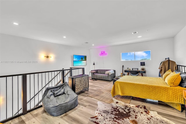 410 NE 36th St Unit 10, Oakland Park, FL 33334 - bedroom featuring wood finished floors and recessed lighting