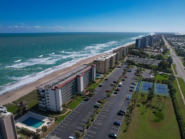 10152 S Ocean Dr Unit 618, Jensen Beach, FL 34957 - drone / aerial view of waterfront with a beach and apartment complex / building