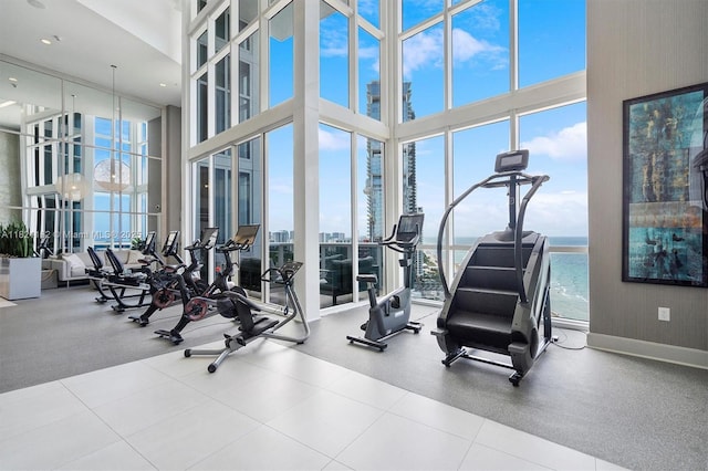 18201 Collins Ave Unit 2008, Sunny Isles Beach, FL 33160 - exercise room featuring a towering ceiling and expansive windows