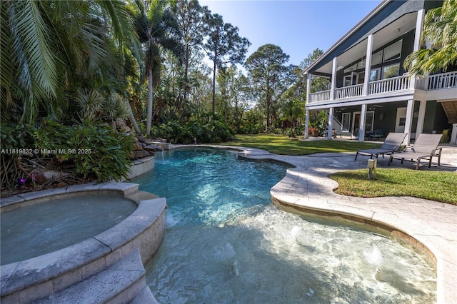 8755 Commodore Dr, Seminole, FL 33776 - view of pool with a pool with connected hot tub, stairs, a lawn, a patio, and a ceiling fan