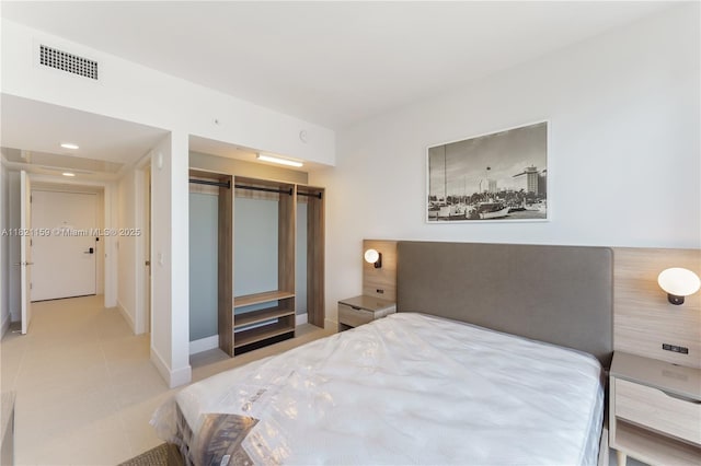 159 NE 6th St Unit 3016, Miami, FL 33132 - tiled bedroom with a closet and baseboards