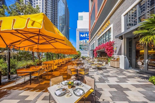 159 NE 6th St Unit 3016, Miami, FL 33132 - view of patio / terrace featuring outdoor dining area and a view of city