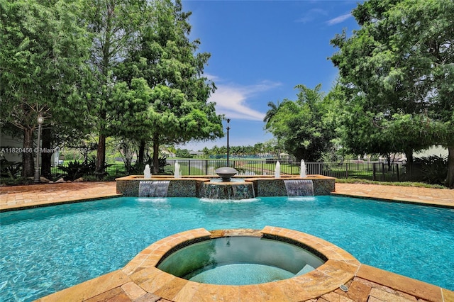 15093 SW 16th St, Davie, FL 33326 - view of swimming pool featuring a pool with connected hot tub