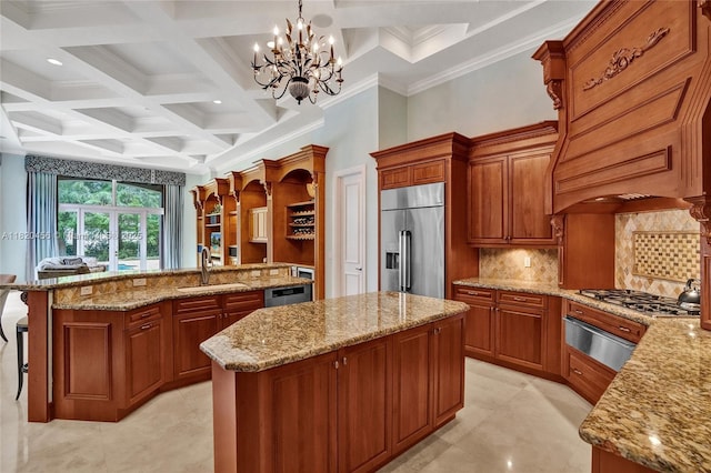 15093 SW 16th St, Davie, FL 33326 - kitchen with an island with sink, stainless steel appliances, coffered ceiling, a chandelier, and a warming drawer