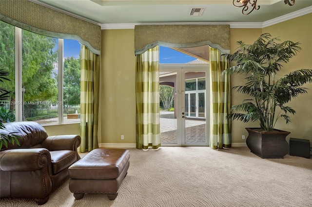 15093 SW 16th St, Davie, FL 33326 - sitting room with french doors, carpet floors, healthy amount of natural light, and crown molding