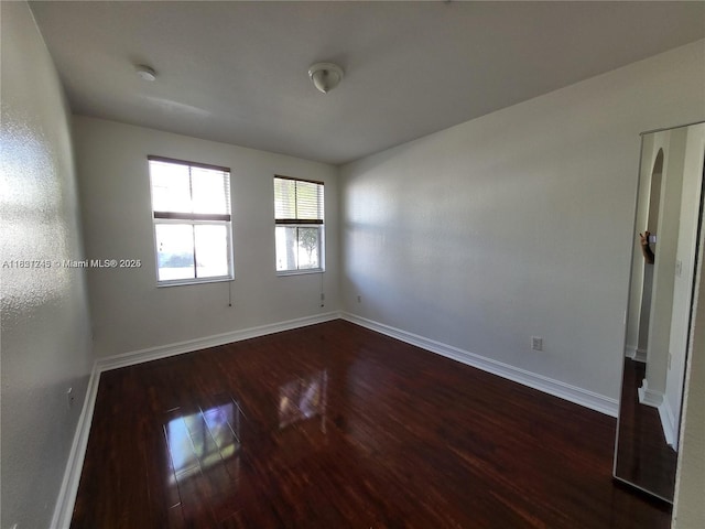 7633 NW 114th Path Unit 7633, Doral, FL 33178 - spare room with dark wood-style floors and a smoke detector