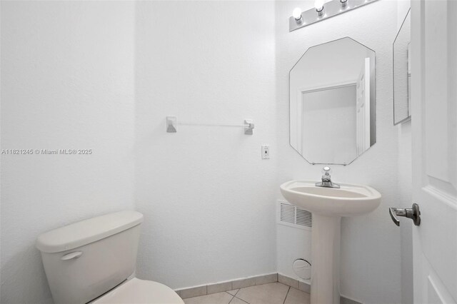 7633 NW 114th Path Unit 7633, Doral, FL 33178 - bathroom featuring toilet and tile patterned flooring