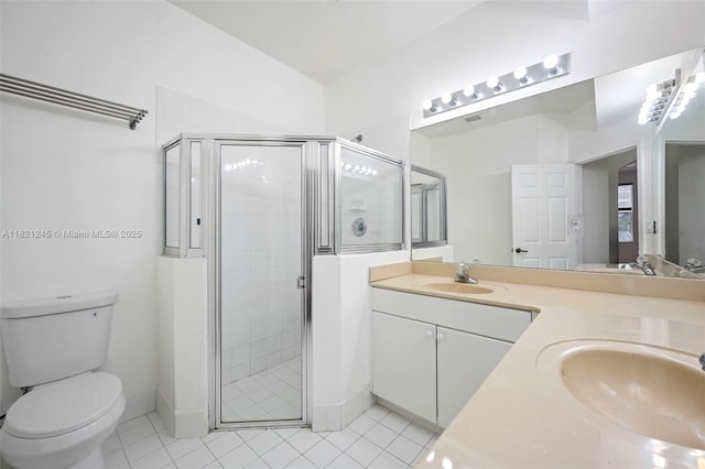 7633 NW 114th Path Unit 7633, Doral, FL 33178 - bathroom with double vanity, a shower stall, and tile patterned floors