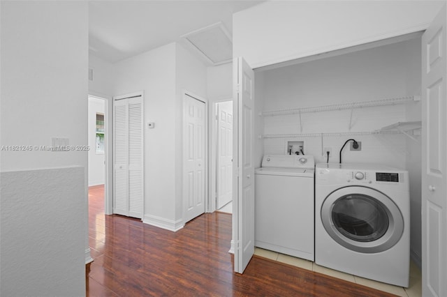 7633 NW 114th Path Unit 7633, Doral, FL 33178 - washroom featuring washer and dryer and wood finished floors